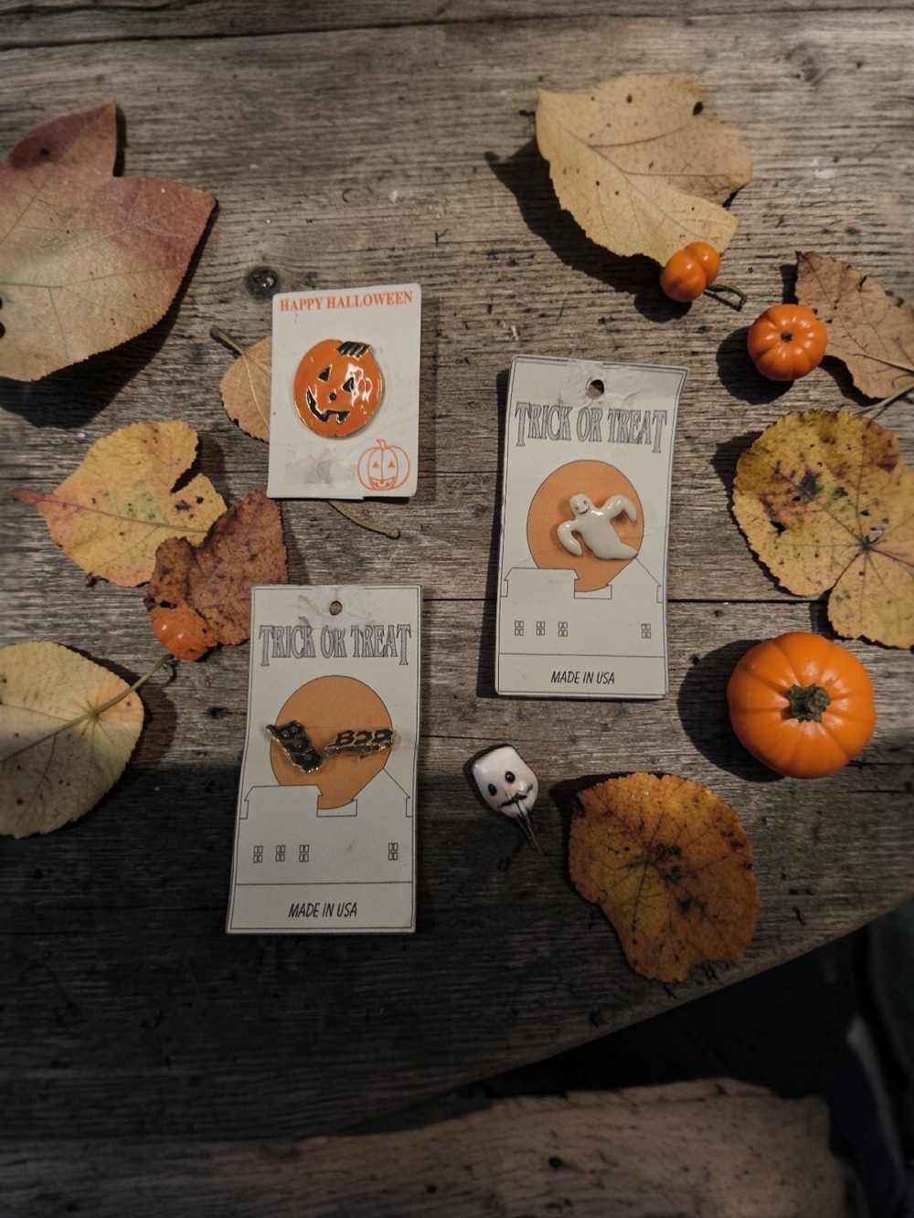 HALLOWEEN ASSORTED PINS AND PIERCED EARRINGS.